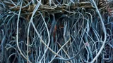 Tightly packed bale of mixed insulated wire