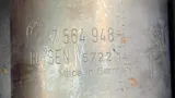 Close-up of the stamp on a used BMW catalytic converter: BMW logo, part number 7 564 948, the supplier name Boysen, and Made in Germany